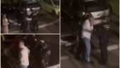 ČEDA ŠUTIRA AUTO DOK GA DRŽE POLICAJCI: Novi snimak incidenta na Novom Beogradu (VIDEO)